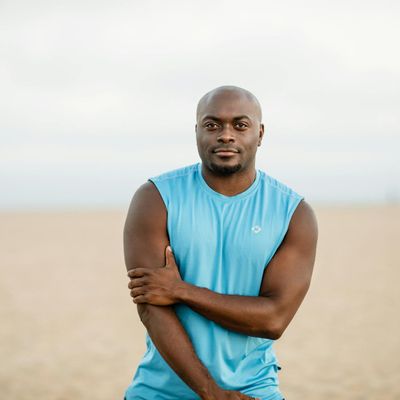 Portrait of a calm and confident male fitness guide.